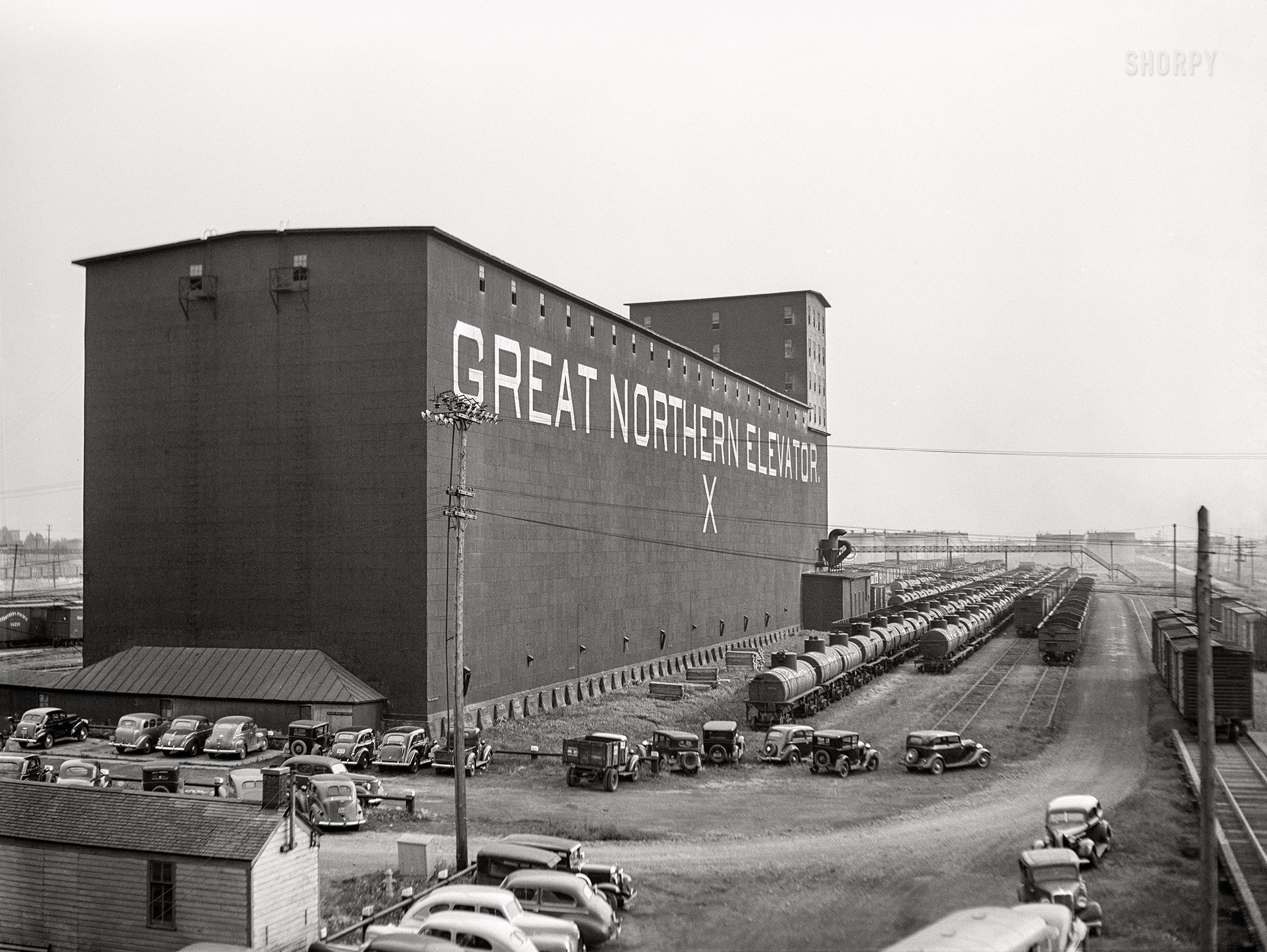 August 1941. "Great Northern grain elevator. Superior, Wisconsin." Medium format acetate negative by John Vachon for the Farm Security Administration. View full size.