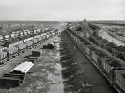 August 1941. "Iron ore from the Minnesota Range in the Great Northern railyards at Superior, Wisconsin." Medium format acetate negative by John Vachon. View full size.
