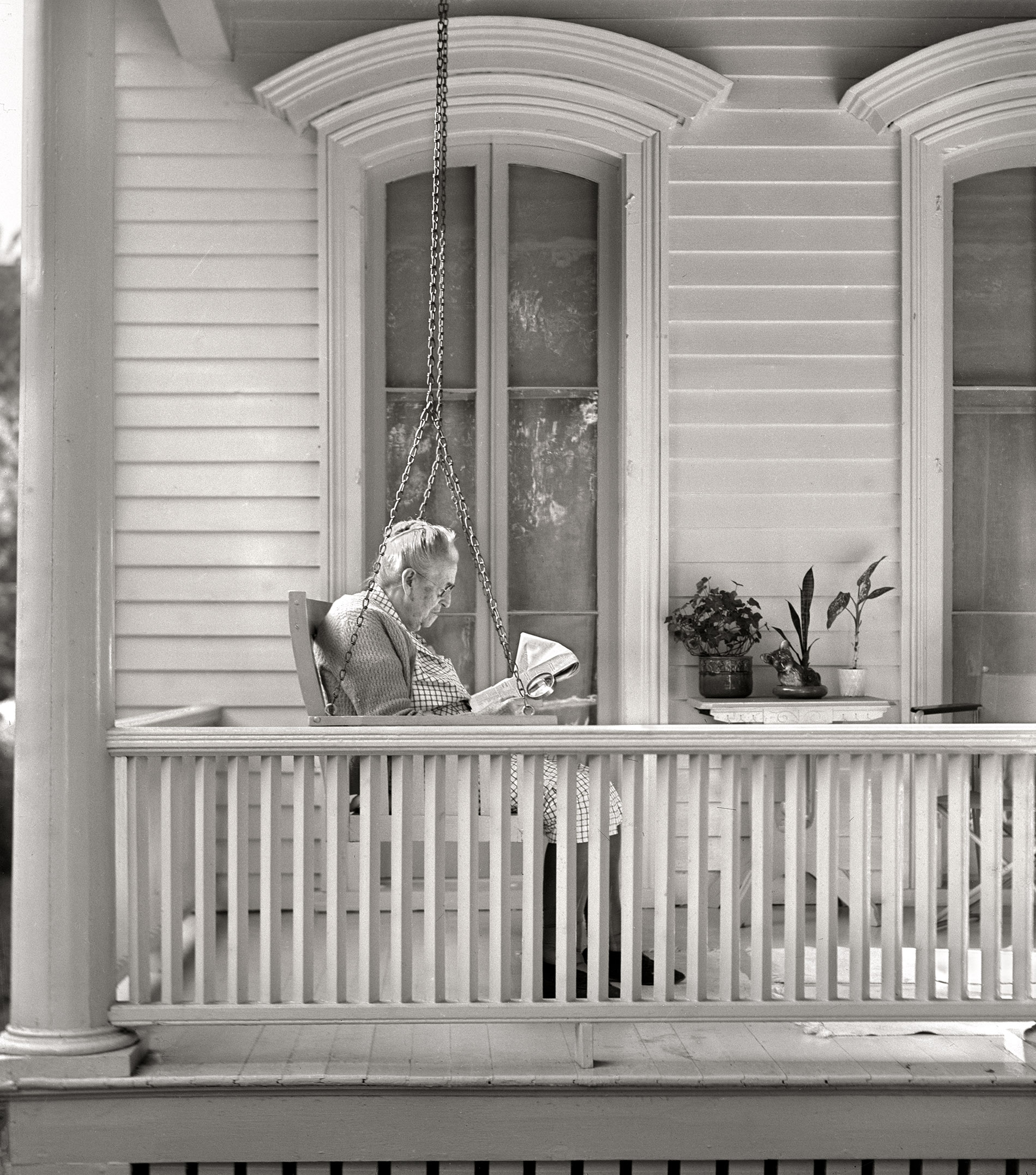 August 1941. "Front porch. Elgin, Illinois." Medium format acetate negative by John Vachon for the Farm Security Administration. View full size.