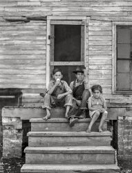 August 1941. "Children of Mexican sugar beet workers on porch of one of the houses at Saginaw Farms, Michigan." Acetate negative by John Vachon. View full size.
