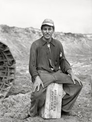 August 1941. "Member of blasting crew at Danube Mine near Bovey, Minnesota." Medium format acetate negative by John Vachon for the Farm Security Administration. View full size.