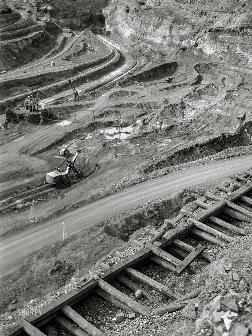 August 1941. "Albany Mine, Hibbing, Minnesota. Iron ore from this mine is brought up by truck." Acetate negative by John Vachon for the Farm Security Administration. View full size.
