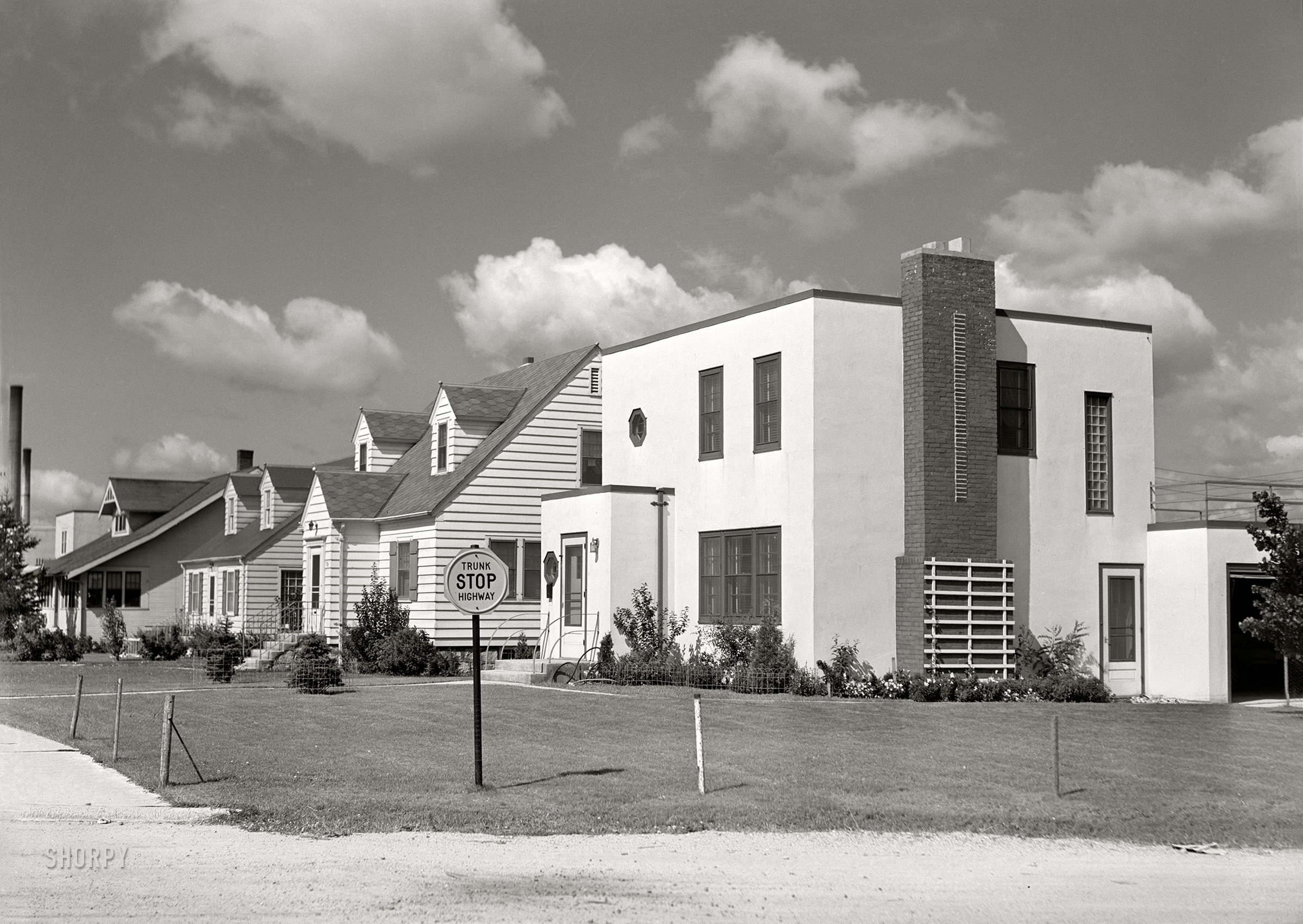 August 1941. "Residential section. Hibbing, Minnesota." The latest thing in houses. Medium format acetate negative by John Vachon for the Farm Security Administration. View full size.