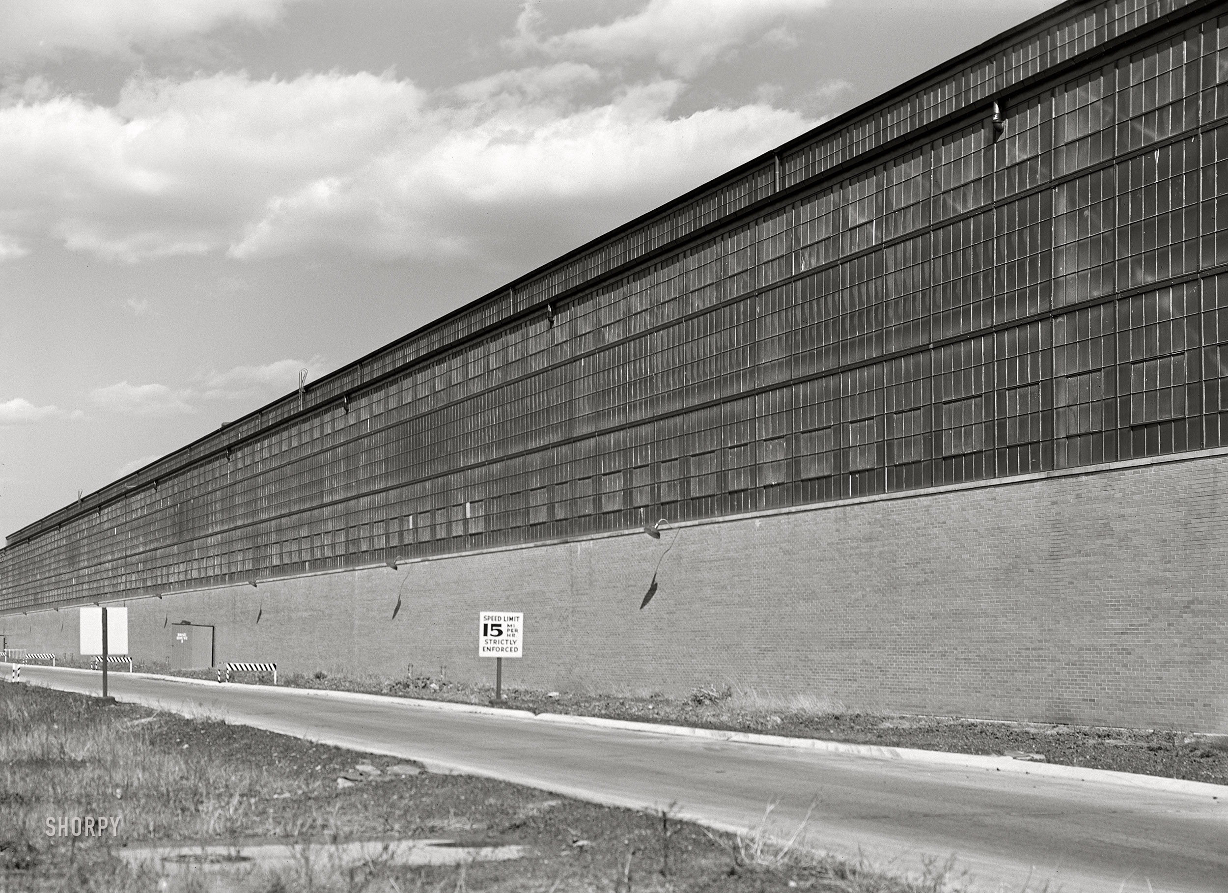 October 1941. "General Motors Fisher Body Ternstedt Division manufacturing plant. West Trenton, New Jersey." Medium format acetate negative by John Vachon. View full size.