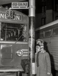 December 24, 1941. Washington, D.C. "Greyhound bus terminal on Christmas eve. Little girl waiting." Medium format acetate negative by John Vachon. View full size.