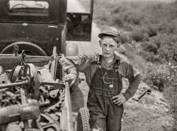 May 1942. "Kearney, Buffalo County, Nebraska. Farm boy bringing a load of scrap iron to town." Seen here earlier fixing a flat. Photo by John Vachon for the FSA. View full size.