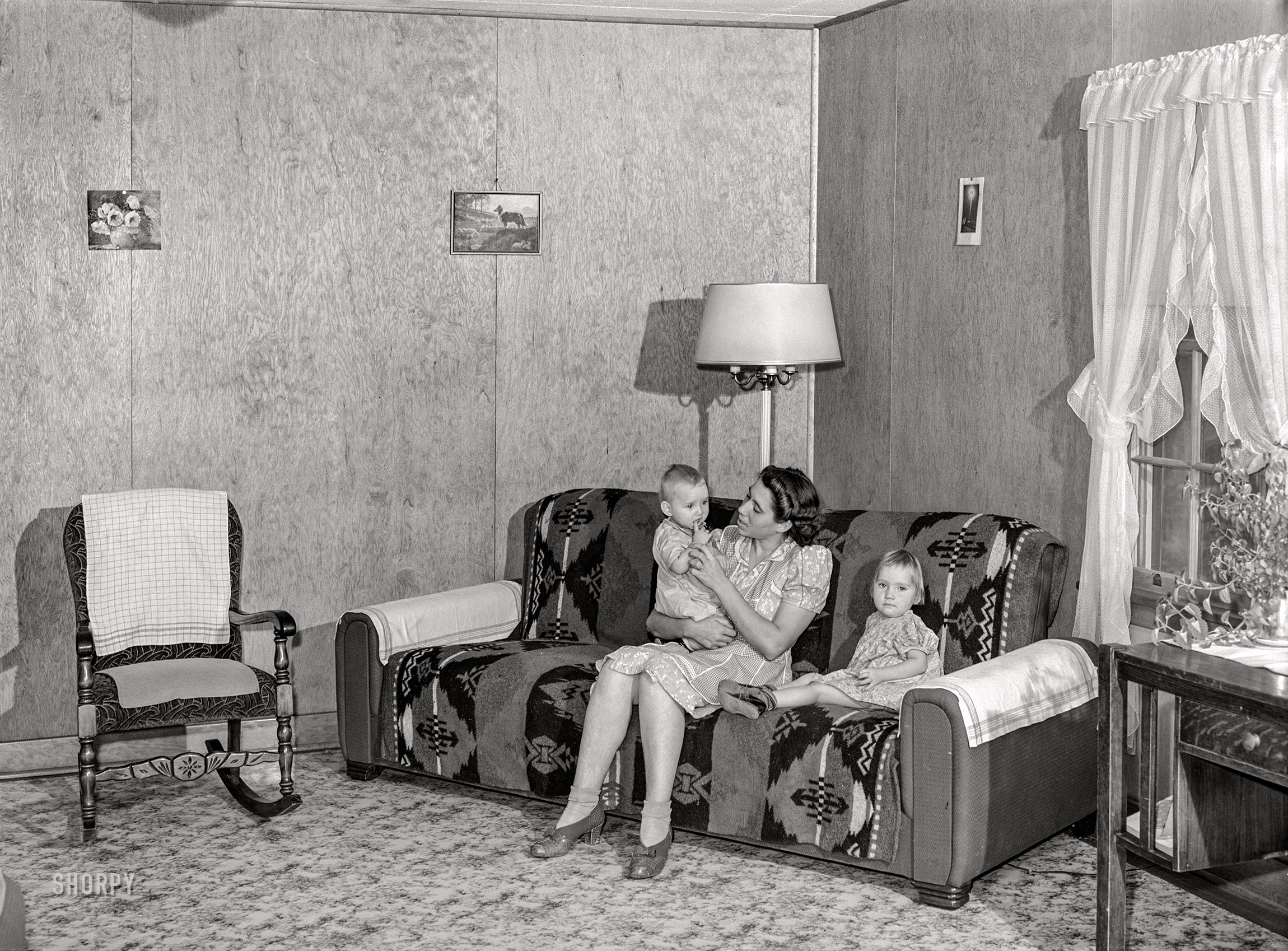 September 1941. "Living room of farm family, members of Boundary Farms FSA project." Acetate negative by Russell Lee for the Farm Security Administration. View full size.
