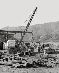 December 1941. "Bending reinforcing steel which will be used in construction of Shasta Dam. Shasta County, California." Photo by Russell Lee, Farm Security Administration. View full size.