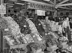 February 1942. "Porterville, California. Vegetable stand in grocery store." Medium format acetate negative by Russell Lee for the Farm Security Administration. View full size.