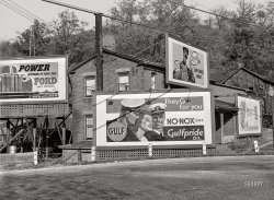 October 1941. "Defense motive in advertising. Elmira, New York." Medium format acetate negative by John Collier for the Farm Security Administration. View full size.