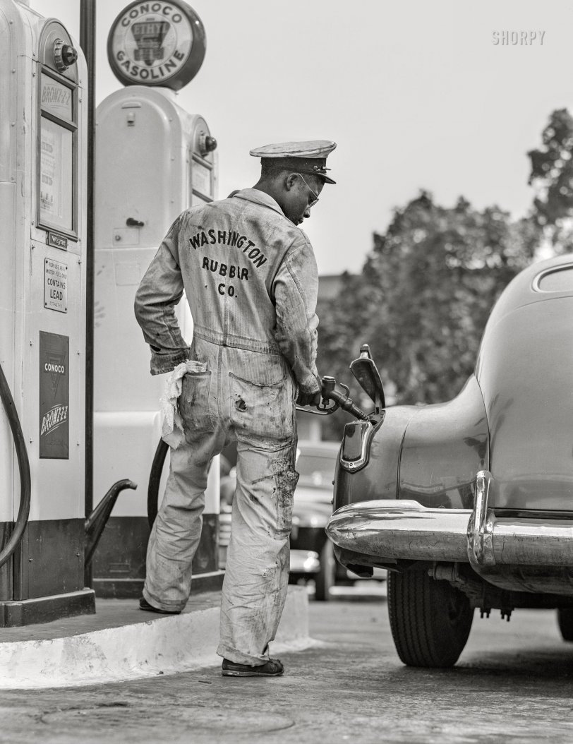 May 14, 1942. Washington, D.C. "Filling up with gas on the day before rationing starts." 4x5 inch acetate negative by John Collier for the Office of War Information. View full size.