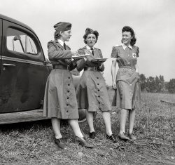 September 1942. Batavia, New York. "Elba farm labor camp. Red Cross workers who fed the migrants on their first day in camp." Acetate negative by John Collier for the FSA. View full size.