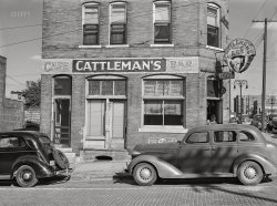 September 1941. "Cattlemen's bar and cafe near Union Stockyards. South Omaha, Nebraska." Acetate negative by Marion Post Wolcott for the Farm Security Administration. View full size.