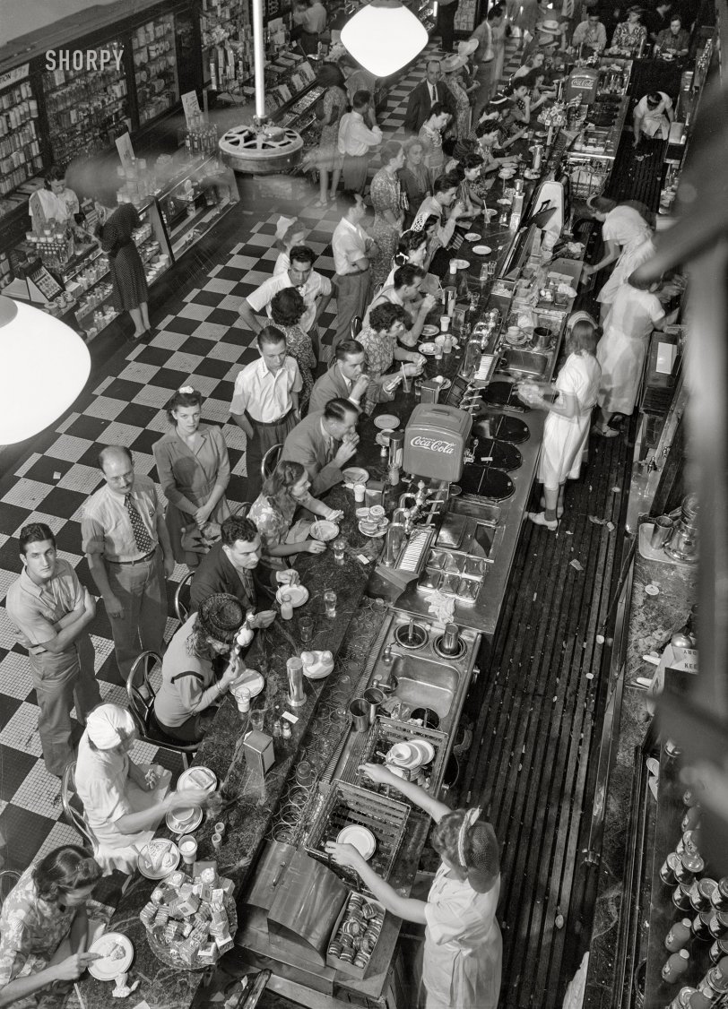 July 1942. Washington, D.C. "People's Drug store lunch counter on G Street N.W. at noon." Acetate negative by Marjory Collins for the Farm Security Administration. View full size.
