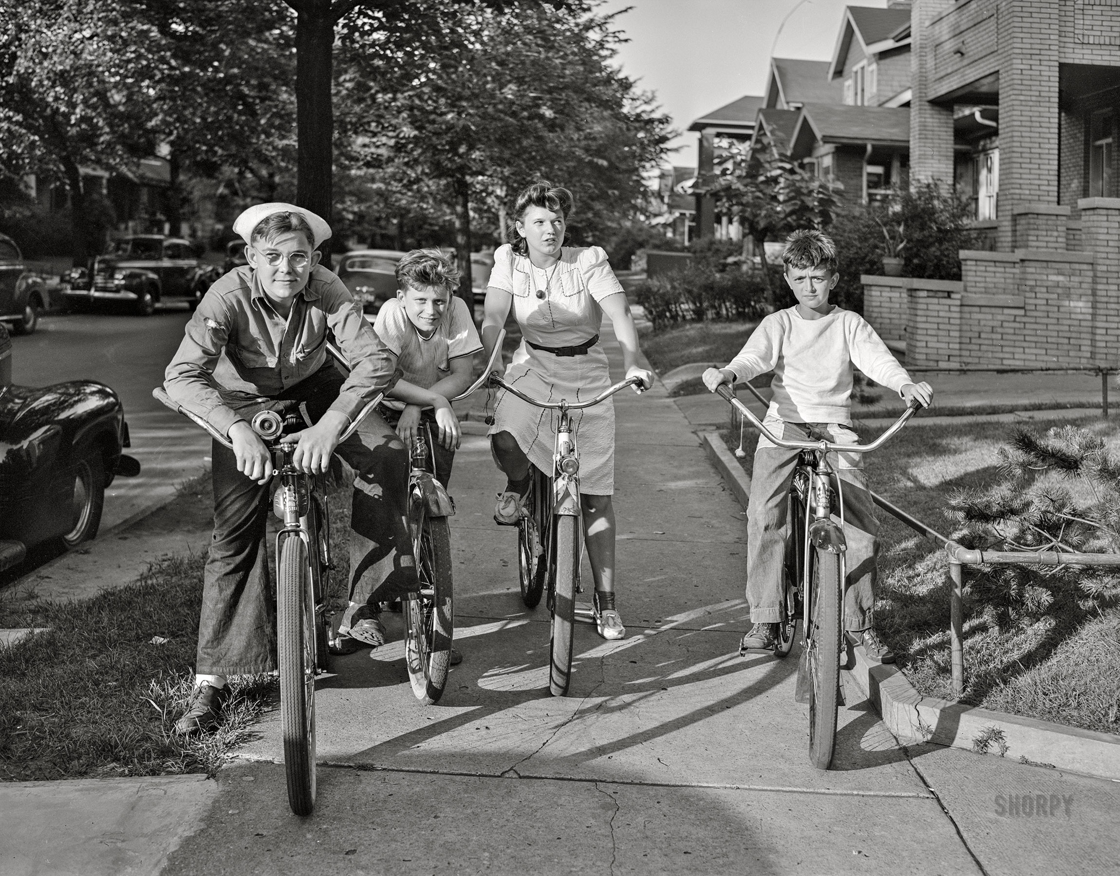July 1942. "Detroit, Michigan. Boys and a girl on bicycles." 4x5 inch acetate negative by Arthur Siegel for the Farm Security Administration. View full size.