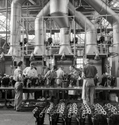 October 1940. "Painting the cylinders of aircraft motors at the Pratt & Whitney plant. East Hartford, Conn." Nitrate negative by Jack Delano. View full size. 