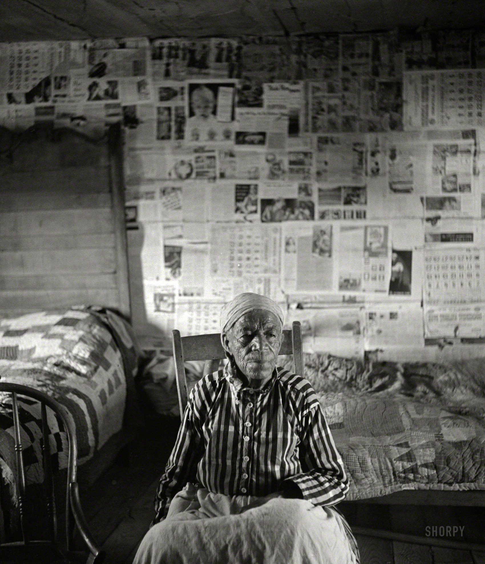 May 1941. "Mulatto ex-slave in her house near Greensboro, Alabama." Nitrate negative by Jack Delano for the Farm Security Administration. View full size.