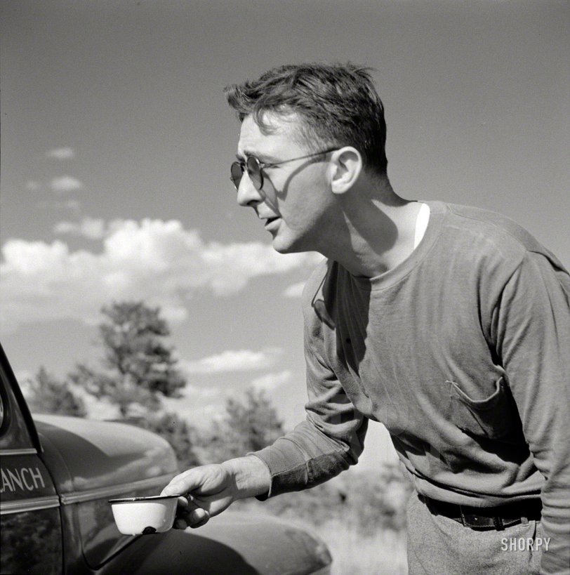August 1941. "Dude from Quarter Circle U Ranch on a picnic on Lyman Brewster's lease. Near Lame Deer, Montana." Photo by Marion Post Wolcott. View full size.
