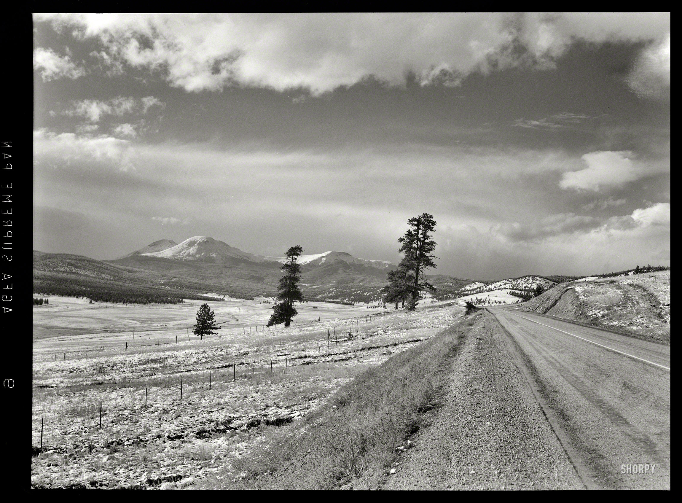 September 1941. "Highway southwest of Denver, Colorado." Photo by Marion Post Wolcott for the Farm Security Administration. View full size.