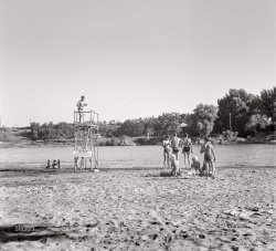 June 1942. "Redding, California. A free municipal beach on the Sacramento River." Medium format nitrate negative by Russell Lee for the Office of War Information. View full size.