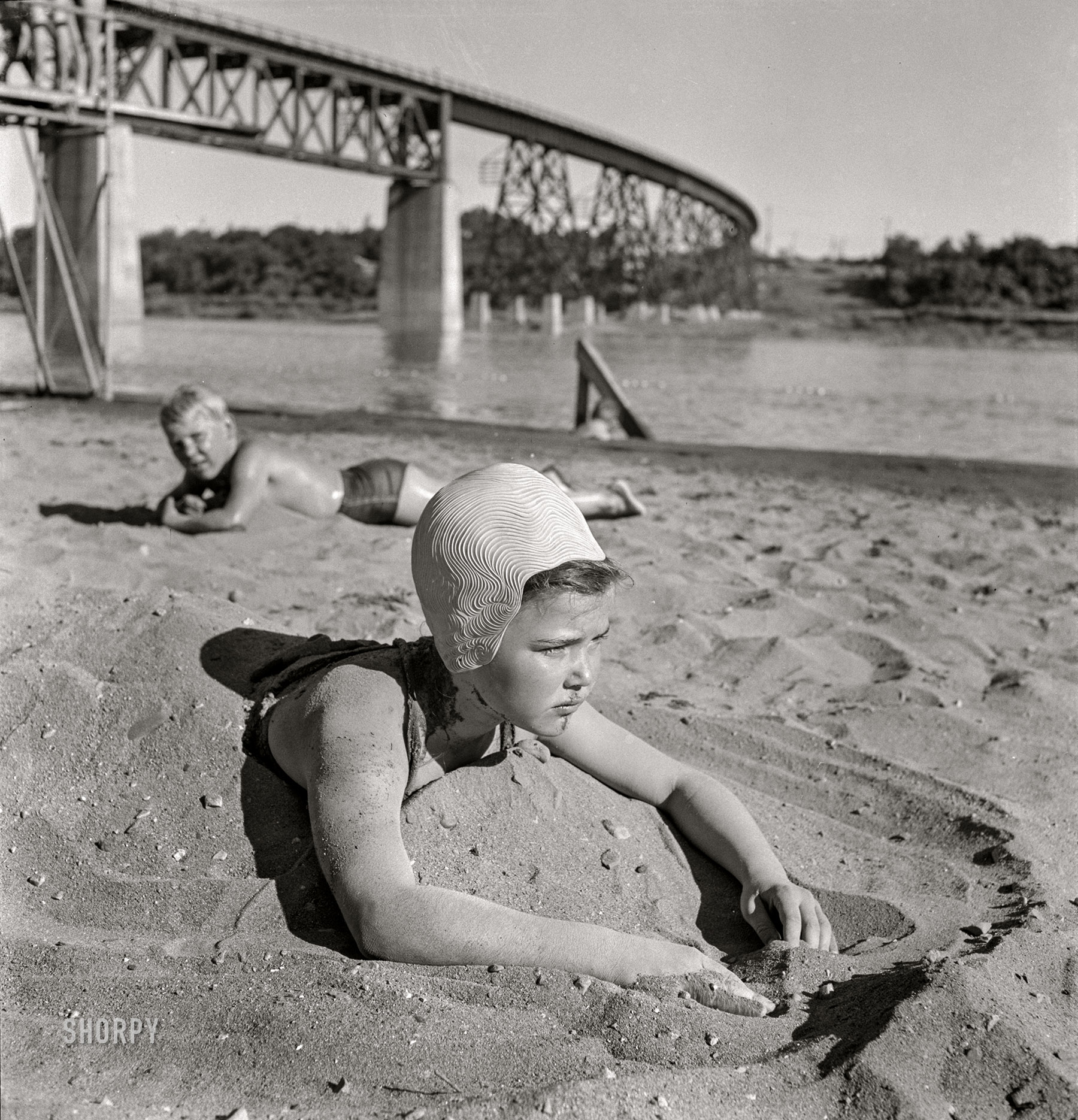 June 1942. "Redding, California. Youngsters at the beach on the Sacramento River." Kids these days! Nitrate negative by Russell Lee for the Office of War Information. View full size.