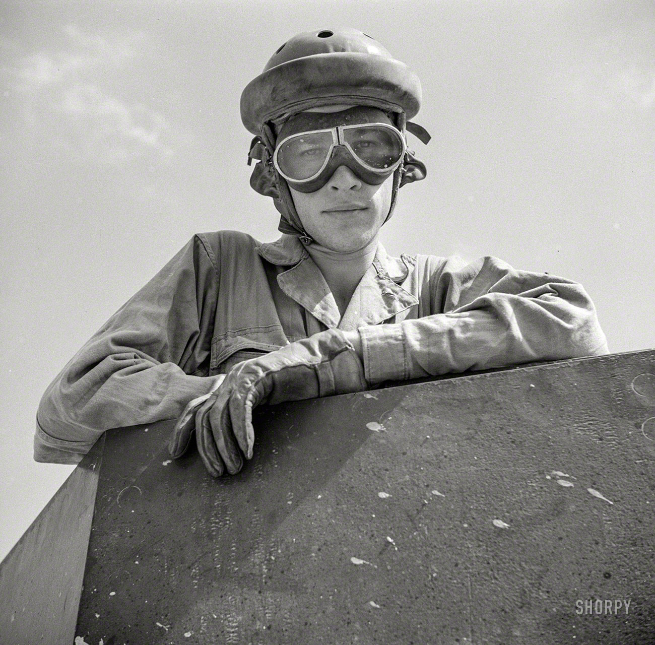August 1941. "Tank driver. Fort Belvoir, Virginia." Medium format negative by John Collier. Office of War Information photo collection. View full size.