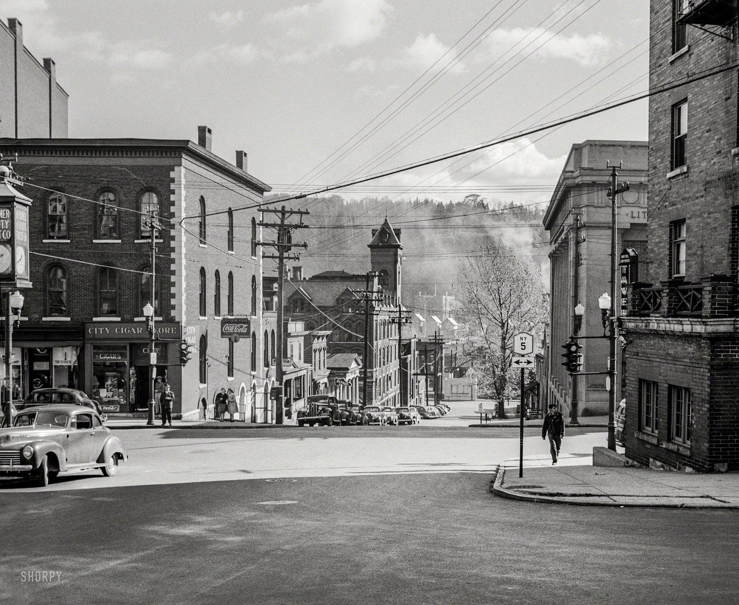 October 1941. "Looking toward the river. Little Falls, New York." Which is at least a two-stoplight town. Medium format negative by John Collier. View full size.