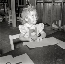 May 1942. "Childersburg, Alabama. Defense worker's child in WPA (Work Projects Administration) day nursery." Medium format negative by John Collier for the Office of War Information. View full size.