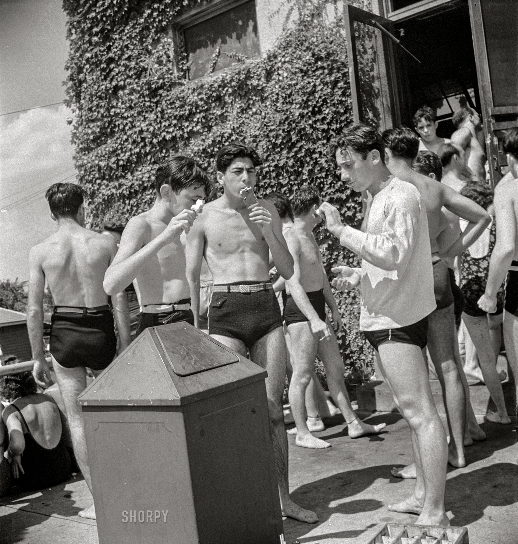 July 1942. Washington, D.C. "Sunday at the municipal swimming pool." Medium format nitrate negative by Marjory Collins for the Office of War Information. View full size.