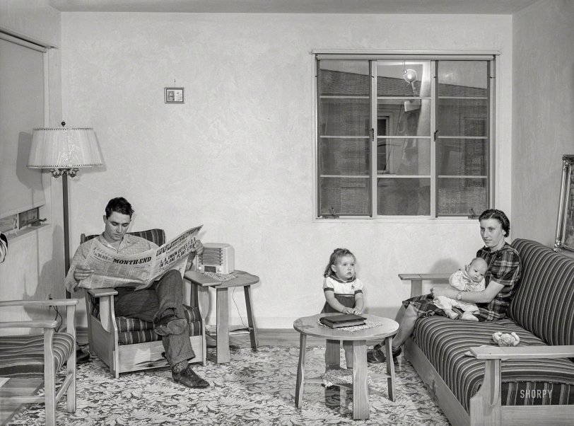 May 1941. San Diego. "Family living at Kearney Mesa defense housing project. This man came out to California from Oklahoma 10 years ago. He has been an agricultural worker and had lived in various FSA camps. Now employed as a painter at Consolidated Aircraft." Medium format negative by Russell Lee for the Farm Security Administration. View full size.
