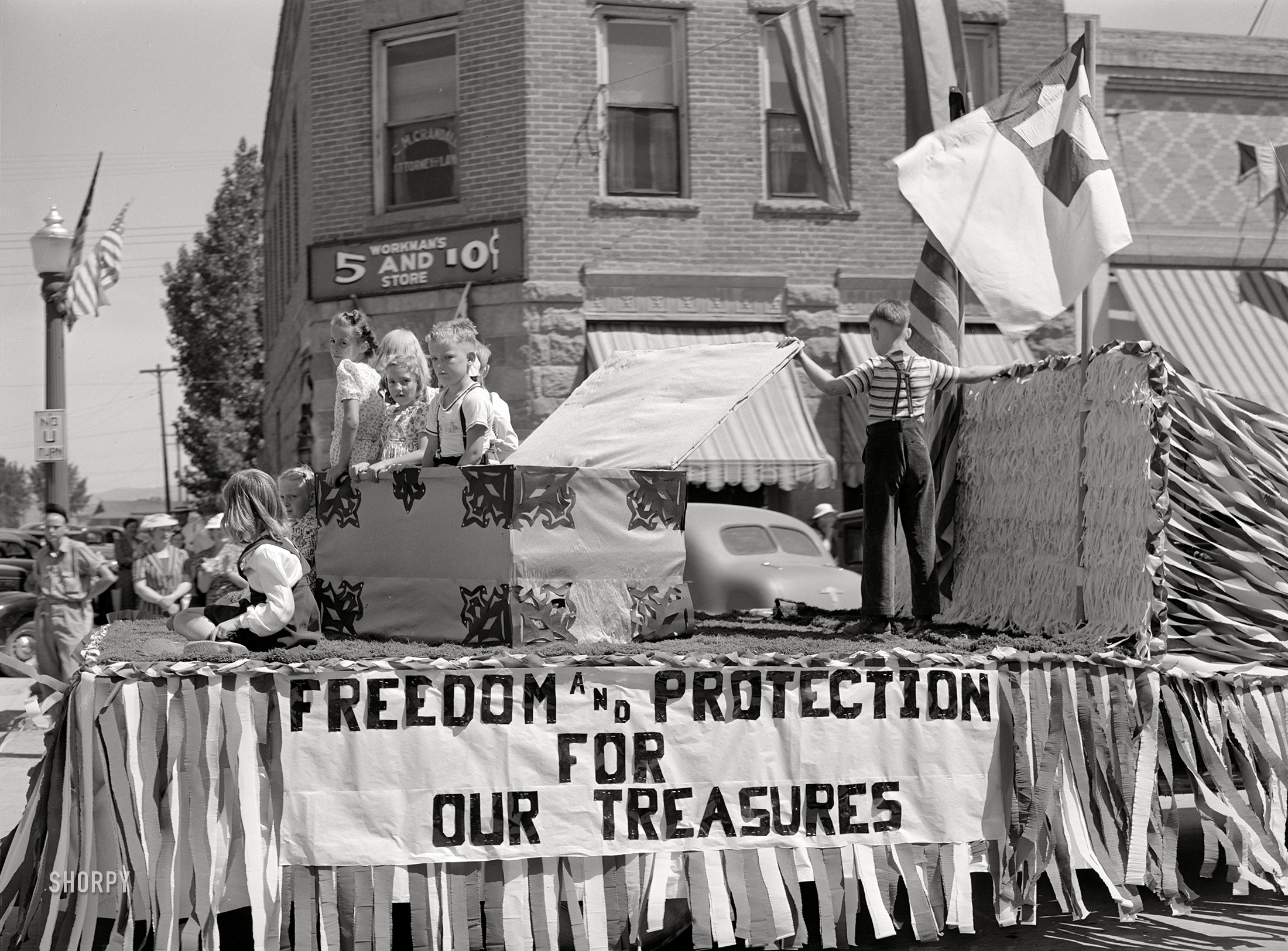 July 4, 1941. Vale, Oregon. "One of the floats in the Fourth of July parade." Medium format acetate negative by Russell Lee for the Farm Security Administration. View full size.
