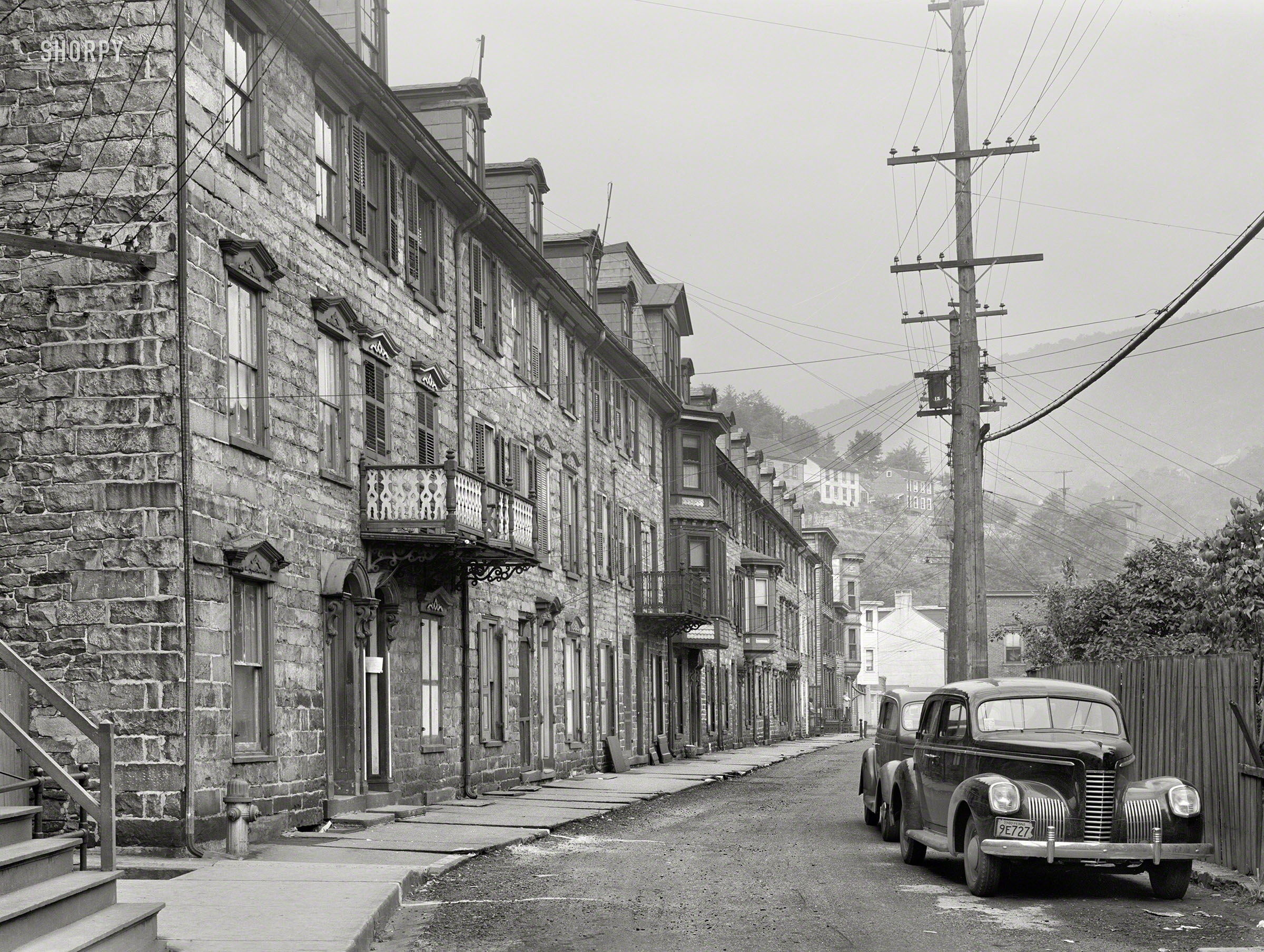 August 1940. "Old houses on Race Street in Mauch Chunk, Pennsylvania." Photo by Jack Delano for the Farm Security Administration. View full size.