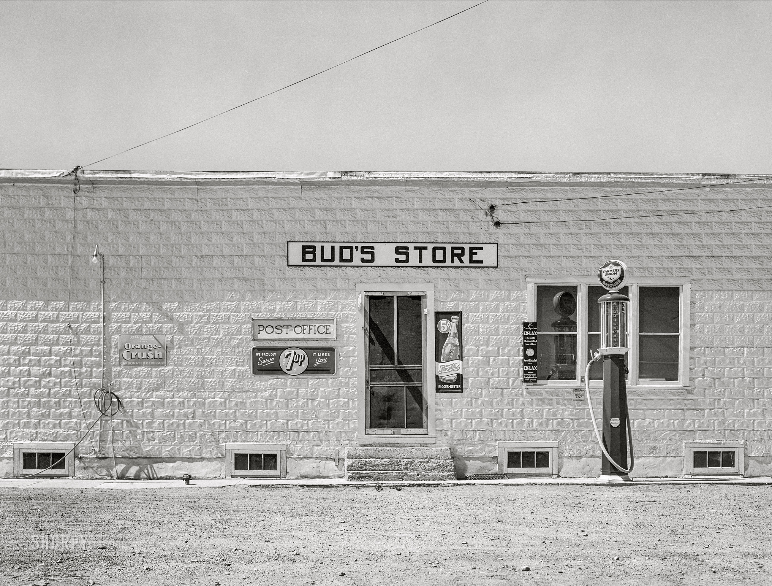 August 1941. "Store on main street of town. Lone Tree, North Dakota." Medium format acetate negative by Marion Post Wolcott for the Farm Security Administration. View full size.