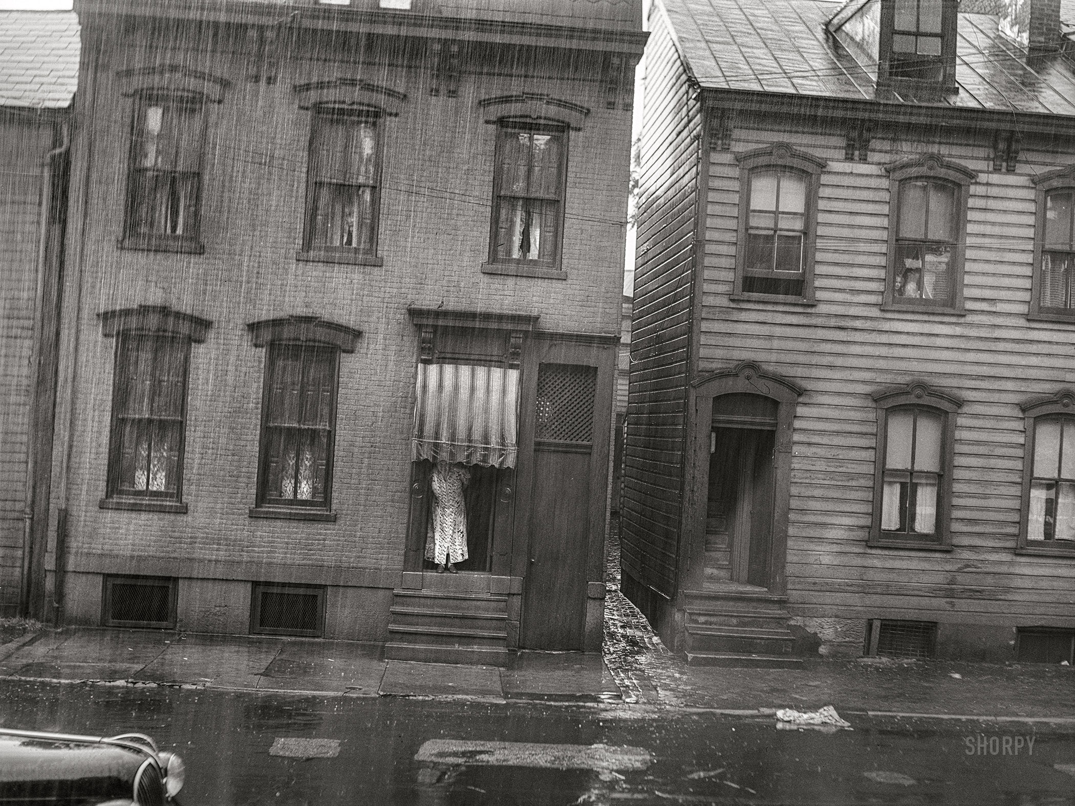 June 1941. "Rain. Pittsburgh, Pennsylvania." Medium format acetate negative by John Vachon for the Farm Security Administration. View full size.