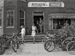 June 1942. Washington, D.C. "A bicycle rental shop on 22nd Street, near Virginia Avenue N.W., on Sunday." Acetate negative by Marjory Collins, Farm Security Administration. View full size.