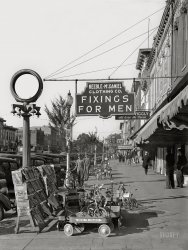 December 1935. "Main street [Broad Street] of Selma, Alabama." 8x10 inch nitrate negative by Walker Evans for the U.S. Resettlement Administration. View full size.