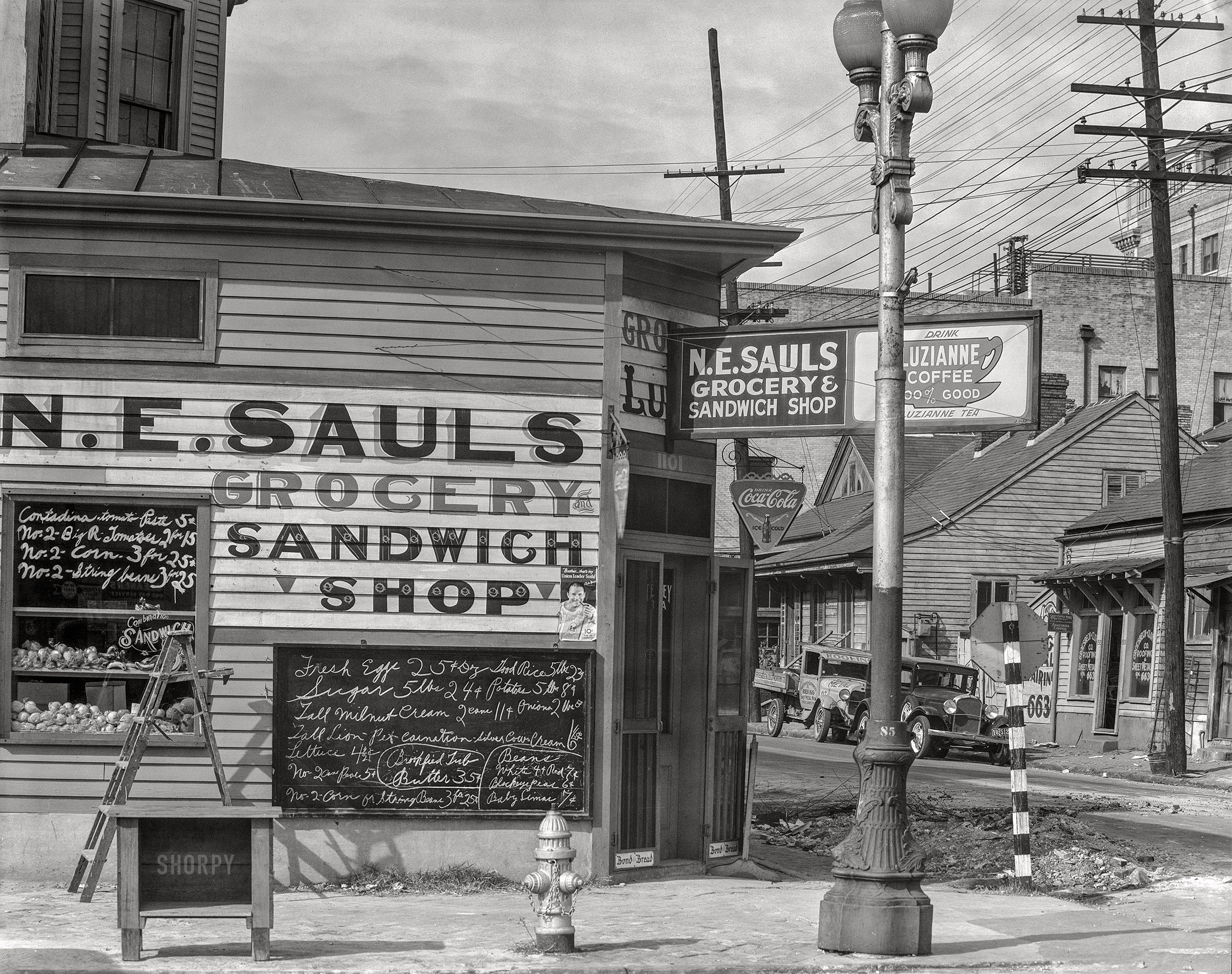 January 1936. "New Orleans sandwich shop. Orleans Parish, Louisiana." 8x10 inch nitrate negative by Walker Evans for the U.S. Resettlement Administration. View full size.