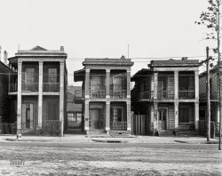 February 1936. "Frame houses. New Orleans, Louisiana." 5x7 inch acetate negative by Walker Evans for the U.S. Resettlement Administration. View full size.