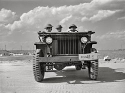 March 1942. Fort Bragg, North Carolina. "41st Engineers, at Negro camp, taking advanced training. Sergeant Franklin Williams, left, in jeep." Acetate negative by Arthur Rothstein for the Foreign Information Service of the U.S. Office of the Coordinator of Information. View full size.
