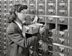 Winter 1942. Washington, D.C. "Jewel Mazique on temporary duty checking filing systems in the Library of Congress." 4x5 inch acetate negative by John Collier for the U.S. Office of the Coordinator of Information. View full size.