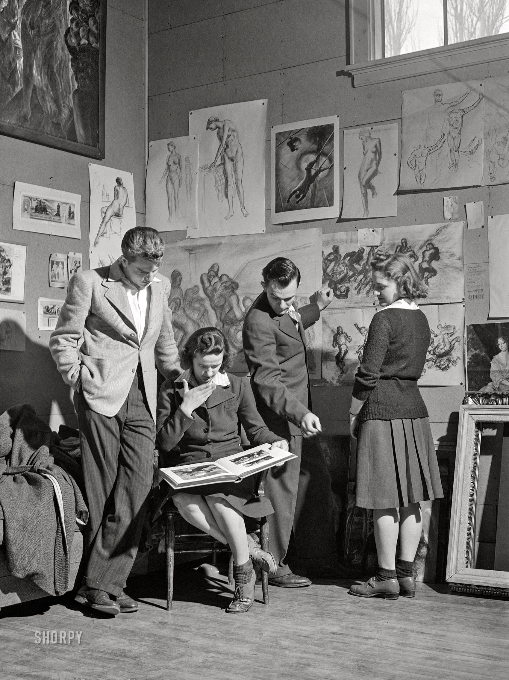 April 1942. Madison, Wisconsin. "Members of the Blue Shield Country Life Club of the University of Wisconsin visiting the studio of John Steuart Curry. One of the aims of the club is to bring about greater participation in cultural activities among farm people." Acetate negative by Jack Delano for the U.S. Office of Coordinator of Information. View full size.