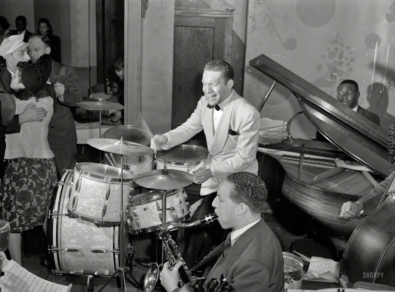April 1942. "Drummer 'Red' Saunders and his band at the Club DeLisa, Chicago." Photo by Jack Delano for the Office of War Information. View full size.
