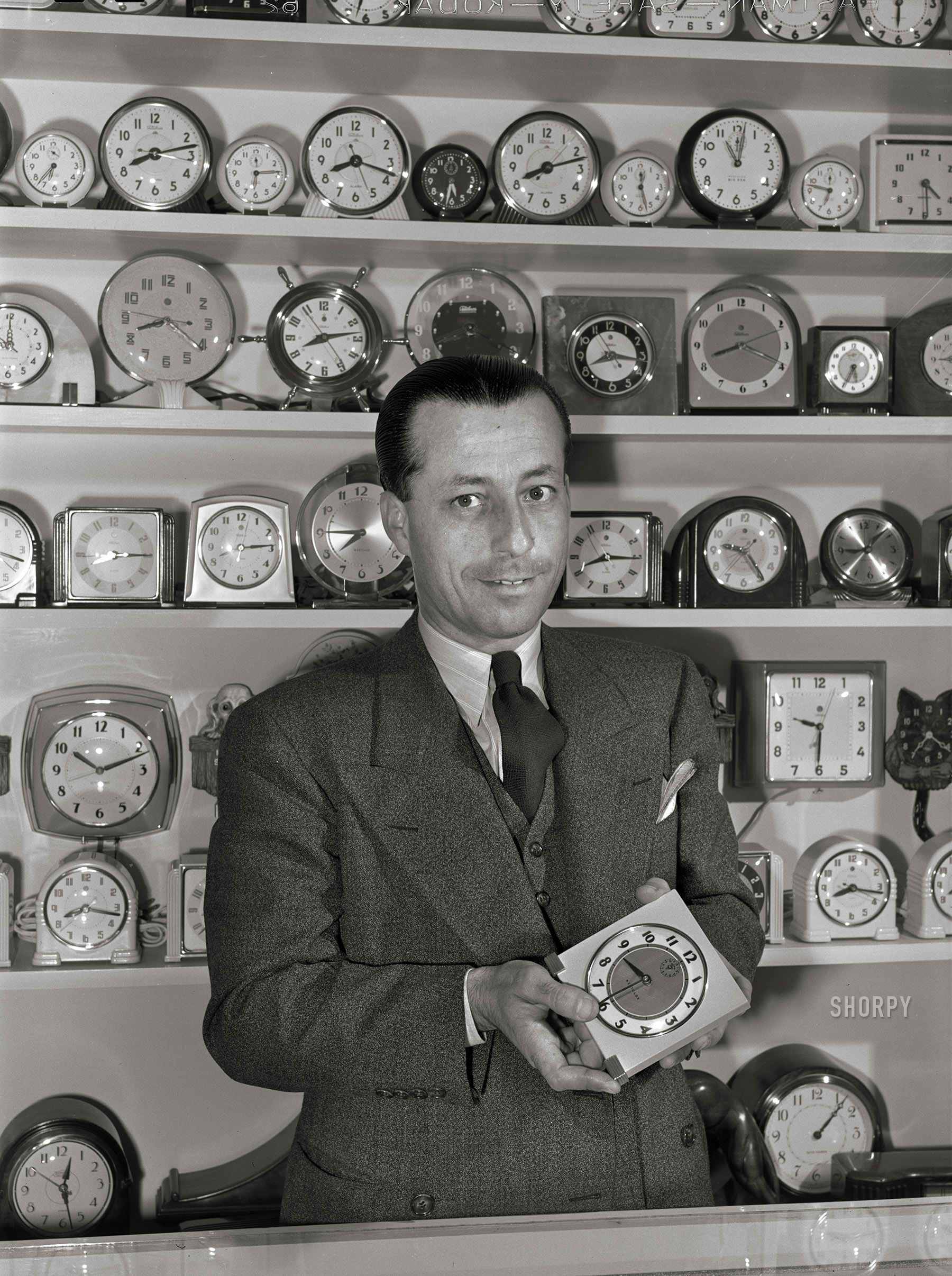 April 1942. "Portuguese-Americans in California. Mr. H. Ormond, who is a leading jeweler in San Leandro, came to the United States from the Azores Islands 23 years ago when he was 17 years old. For three years he lived in San Francisco and then moved to Oakland, where he worked in a jewelry store for ten years. In 1932 he opened his own store in San Leandro. Mr. Ormond and his wife have worked long hours to build their establishment and now hold a respected position in the social and business life of San Leandro. Mr. Ormond said, 'I received my education as a boy in the Azores but I have found that all the things that I learned there as well as the principles of honesty and integrity and thrift and industry that my parents taught me have served me well in my adopted country. While I now speak a different language, all the principles of life in the United States and the Azores are the same'." Photo by Russell Lee for the Foreign Information Service of the U.S. Office of Coordinator of Information. View full size.