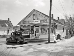 April 1942. Provincetown, Massachusetts. "Market in Portuguese fishermen's section." The grocery seen here in the previous post. 4x5 acetate negative by John Collier. View full size.