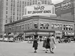 May 1942. "Street corner in downtown Lincoln during University of Nebraska commencement week." Medium format acetate negative by John Vachon. View full size.