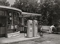 May 1942. "Cooperative gas station at Greenbelt, Maryland, a model community planned by the Suburban Division of the U.S. Resettlement Administration." 4x5 inch acetate negative by Marjory Collins for the Resettlement Administration. View full size.