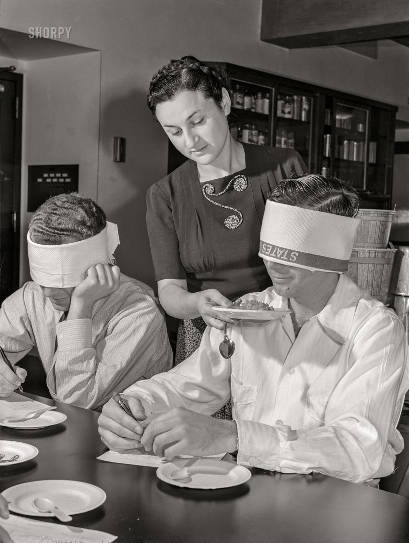 June 1942. "Experiments in dehydration at the U.S. Department of Agriculture Western Regional Agricultural Research Laboratory in Albany, California. Blindfold test for aroma of cooked dehydrated carrots." Acetate negative by Russell Lee. View full size.