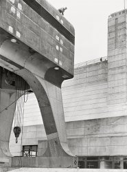 June 1942. Jefferson County, Tennessee. "Tennessee Valley Authority -- Cherokee Dam, Holston River. Riveter atop a 250-ton hoist." Acetate negative by Arthur Rothstein. View full size.