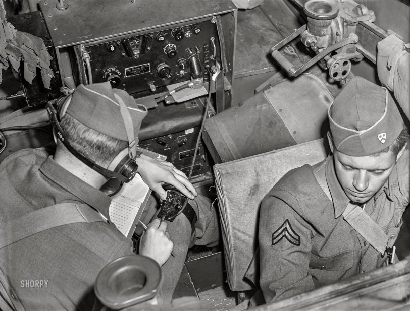 April 1942. "Fort Riley, Kansas. Signal Corps unit communicating by radio from a scout car during a field problem." Acetate negative by Jack Delano. View full size.