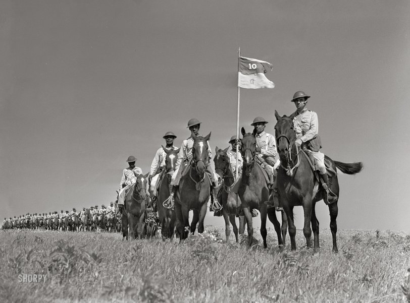 April 1942. "Fort Riley, Kansas. G troop of the 10th Cavalry brigade." The African-American regiment of "Buffalo Soldiers" fame. Acetate negative by Jack Delano. View full size.